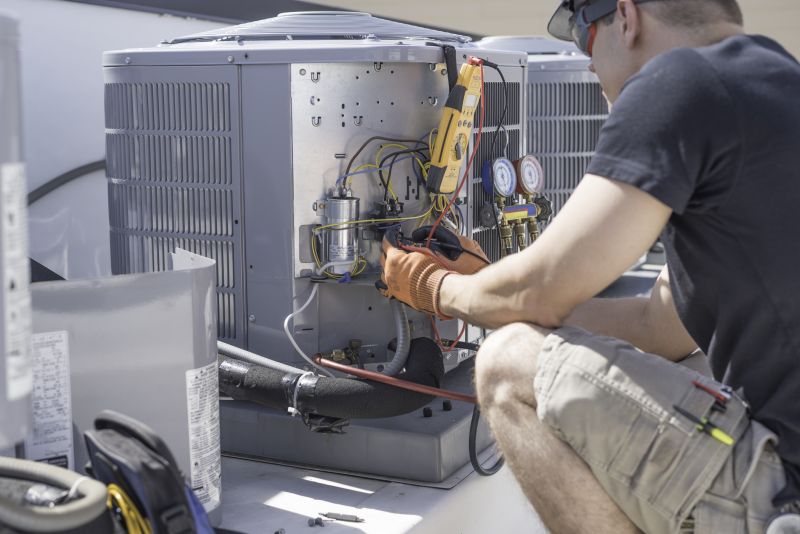 HVAC Technician Inspecting Equipment